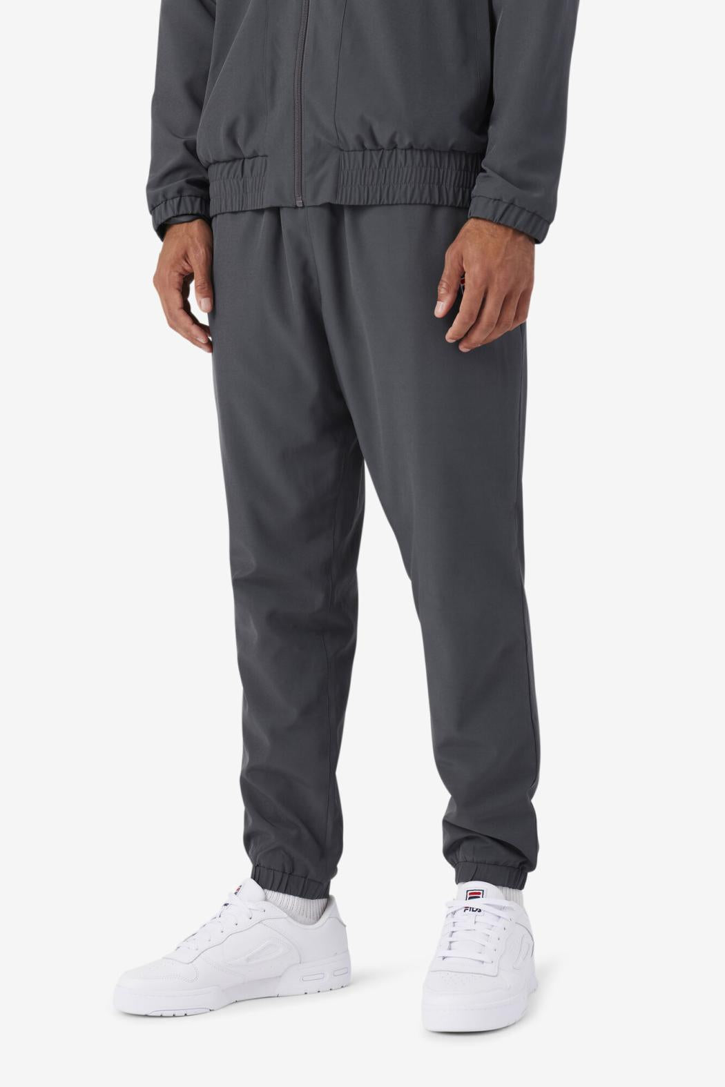 FILA Amar Track Pant 050 DARK SHADOW / ELECTRIC PURPLE / CERAMIC / WHITE | Men Sweatsuits &amp; Tracksuits