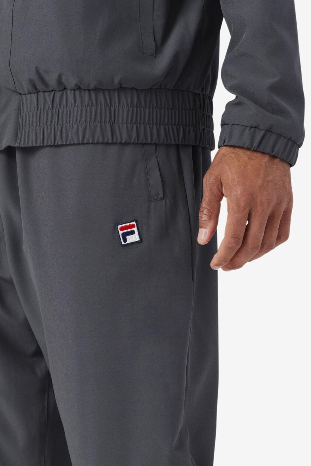 FILA Amar Track Pant 050 DARK SHADOW / ELECTRIC PURPLE / CERAMIC / WHITE | Men Sweatsuits &amp; Tracksuits