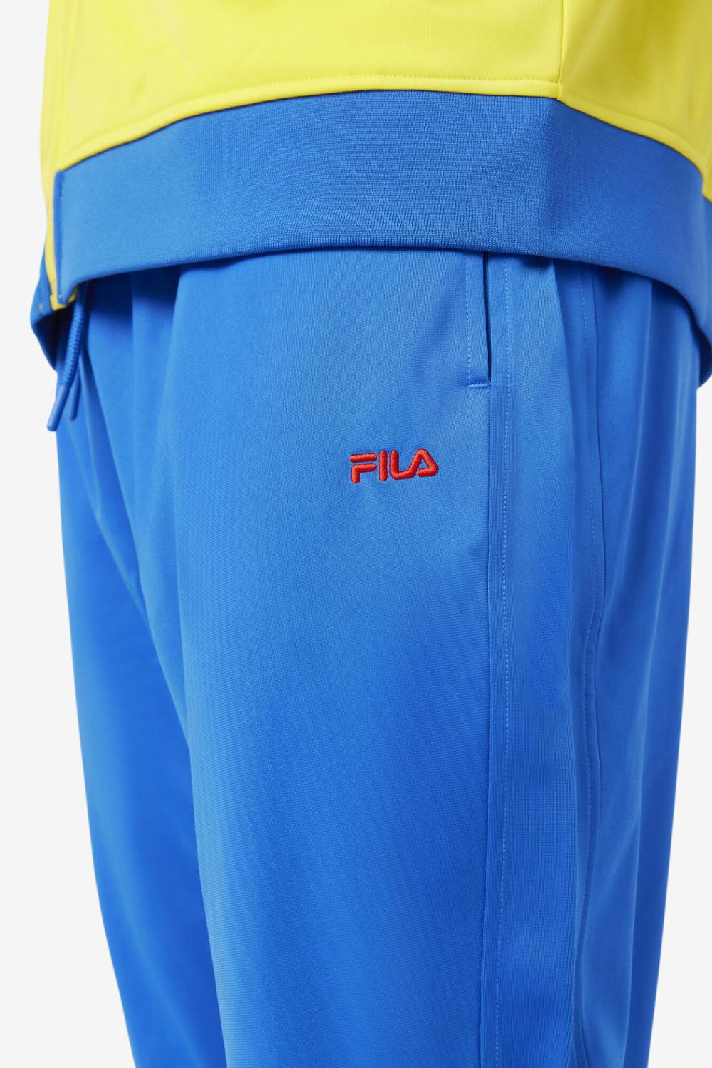 FILA Colombia Track Pant 446 LAPIS BLUE / FIERY RED | Men Sweatsuits &amp; Tracksuits