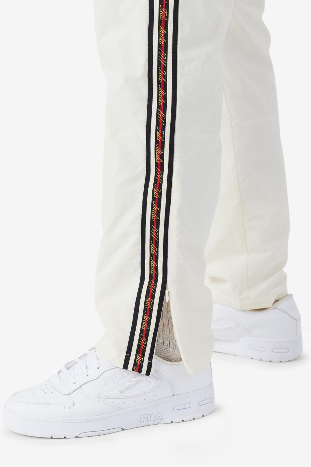 FILA Faras Windpant 132 GARDENIA / BLACK / FILA RED | Men Sweatsuits &amp; Tracksuits