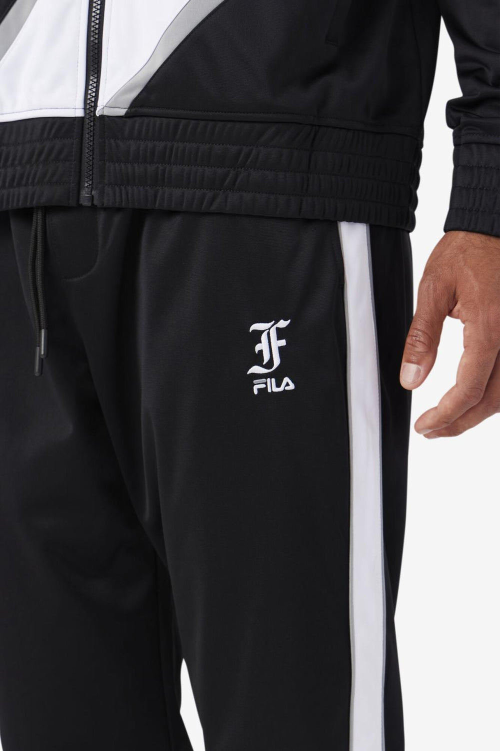 FILA Runi Track Pant 001 BLACK / WHITE / MONUMENT | Men Sweatsuits &amp; Tracksuits