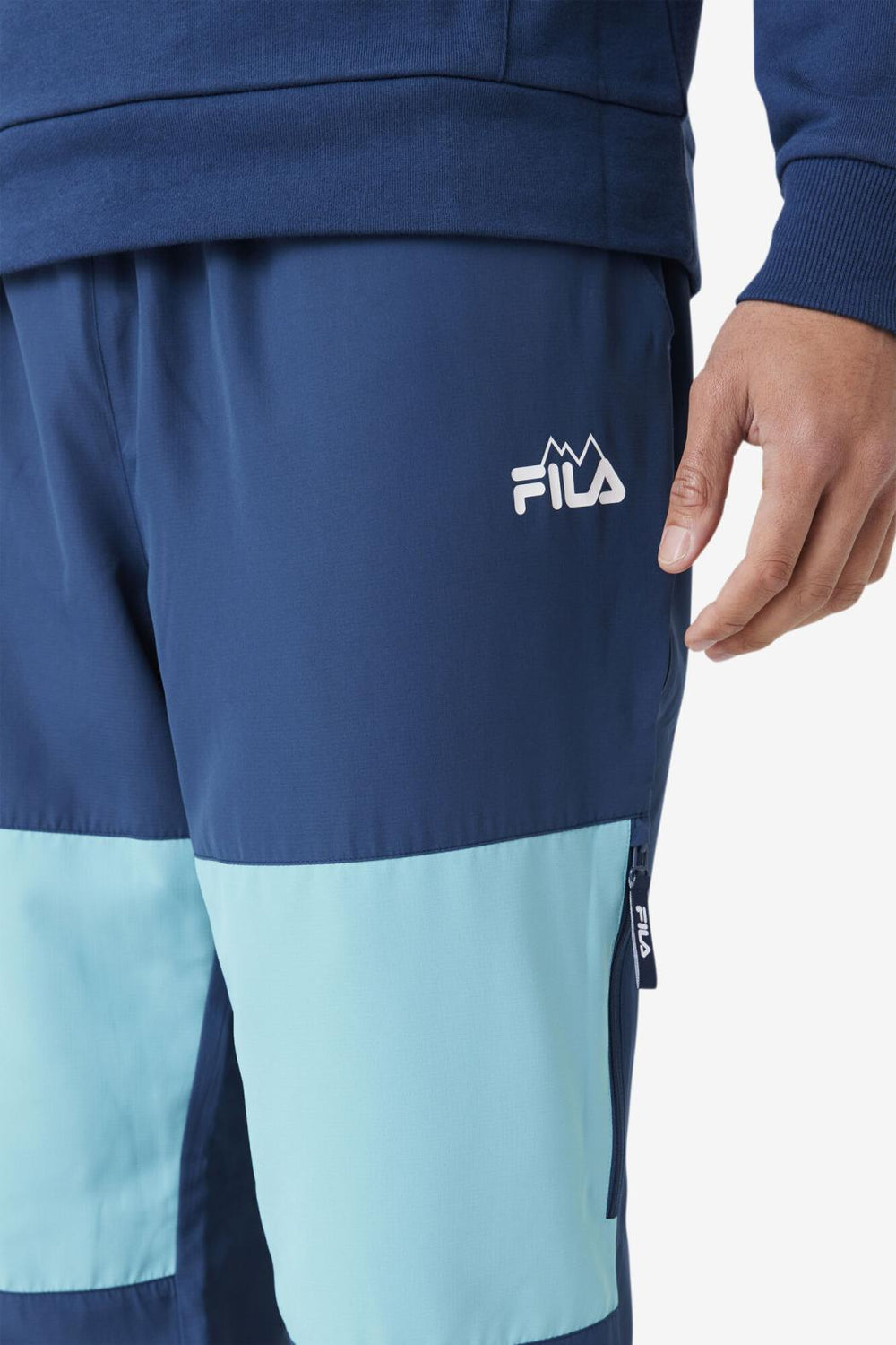 FILA Vinodi Windpant 934 FRENCH NAVY / BAYOU / CHERRY TOMATO | Men Pants &amp; Shorts